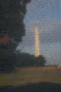 The Vietnam Veterans Memorial is located on the National Mall in Washington, DC; it is north of the Lincoln Memorial and the Reflecting Pool. It honors U.S. men and women who served in the Vietnam War (1959-1975). The memorial consists of three parts: the Vietnam Veterans Memorial Wall, the Three Servicemen Statue and Flagpole, and the Vietnam Women's Memorial.