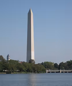 The Washington Monument is located at the west end of the National Mall in Washington, DC, and honors the first President of the United States, George Washington (1732-1799). It is a tall, four-sided stone structure called an obelisk, and it is modeled after classical monuments found in ancient cultures.